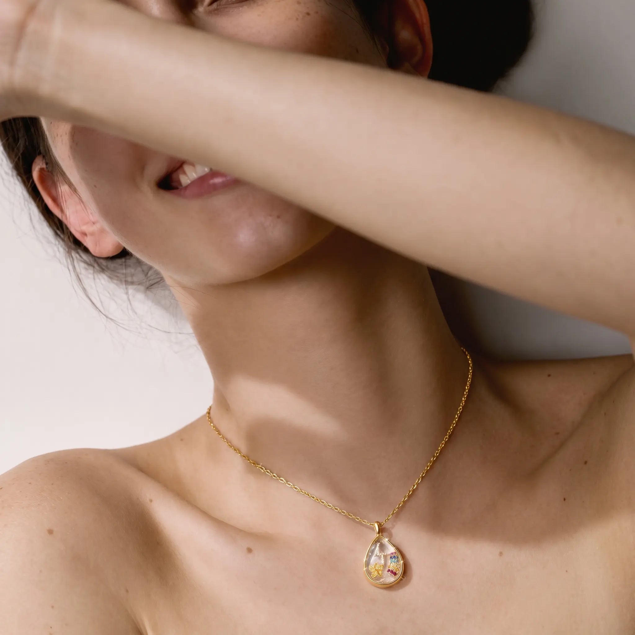 The Keepsake Locket, Ocean Crystal, worn
