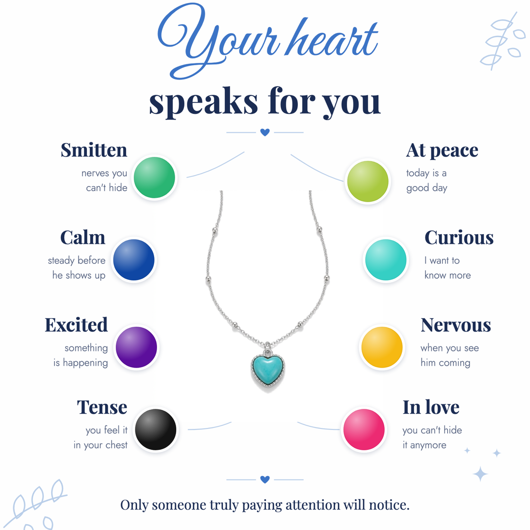 Mood color chart for the Aura Heart necklace, showing eight pendant colors and the feeling each one signals, from calm blue to in-love magenta